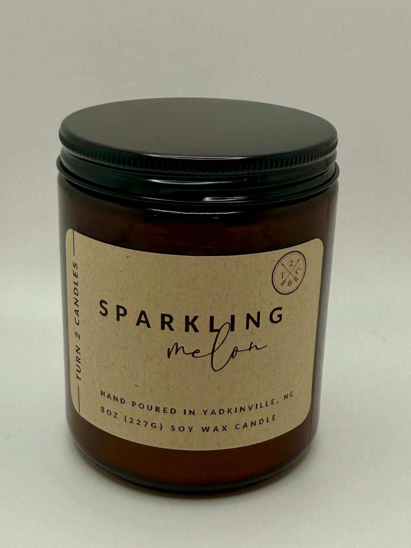 8oz amber jar candle with hand-poured soy wax and clean fragrance oils in dark amber glass