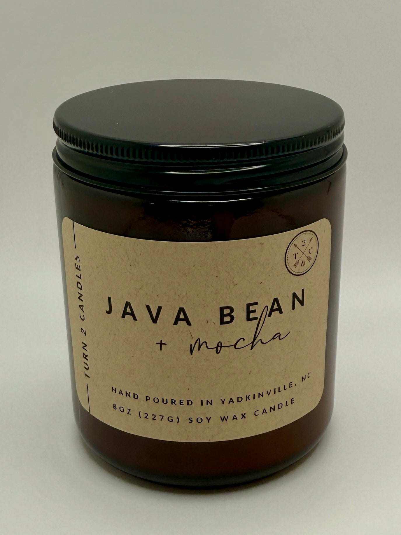 8oz amber jar candle labeled Java Bean Mocha, hand-poured soy wax in amber glass with black lid