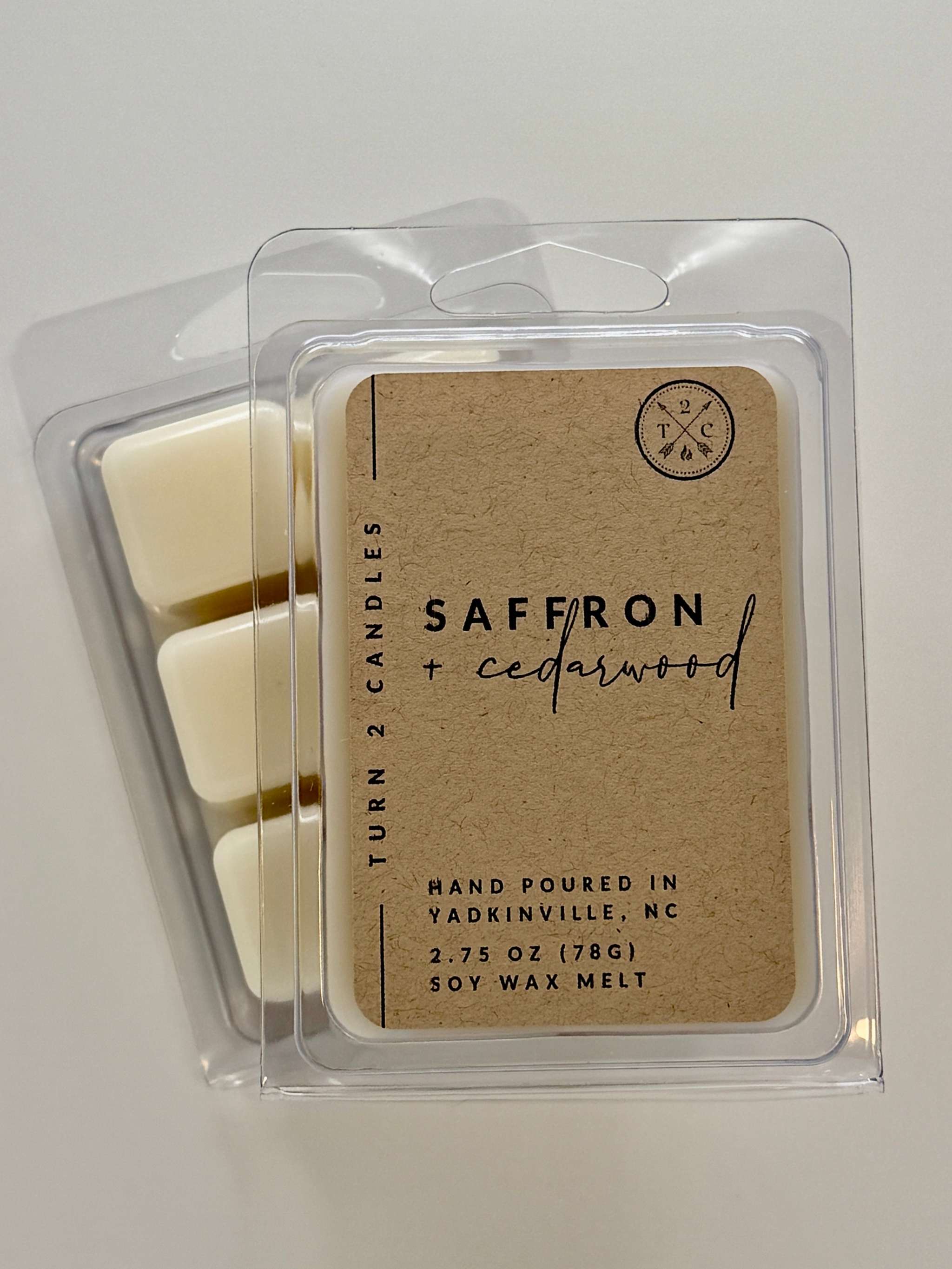 Premium soy wax melts in saffron and cedarwood scent, hand-poured and eco-friendly for long-lasting fragrance.
