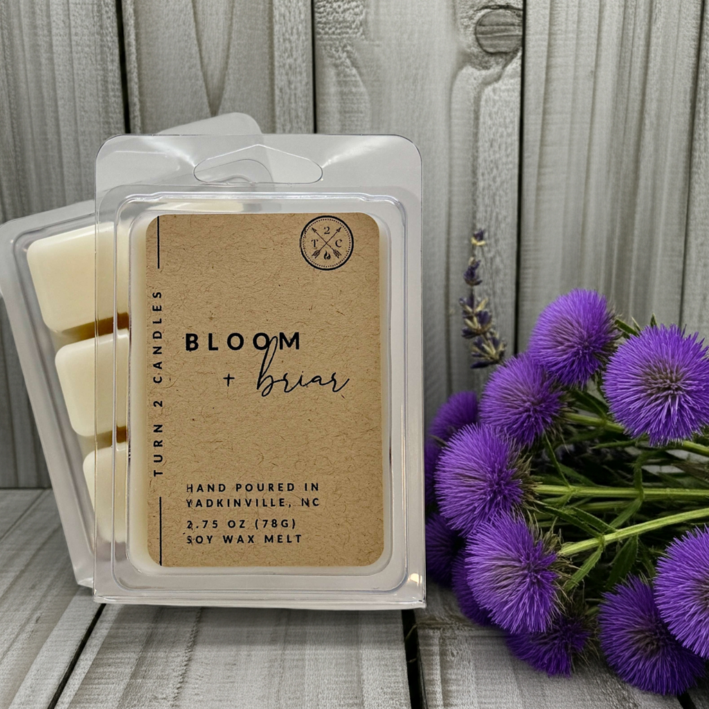Premium Wax Melts hand-poured soy wax cubes in eco-friendly packaging with calming purple flowers