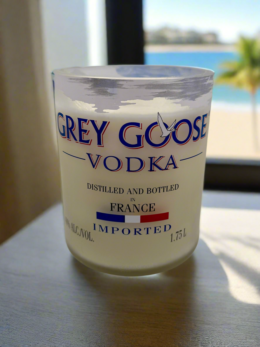 Upcycled vodka bottle candle with Day at the Spa fragrance, made from Grey Goose vodka bottle, 20 oz soy wax, 80-hour burn time, spa-inspired aromatherapy scent
