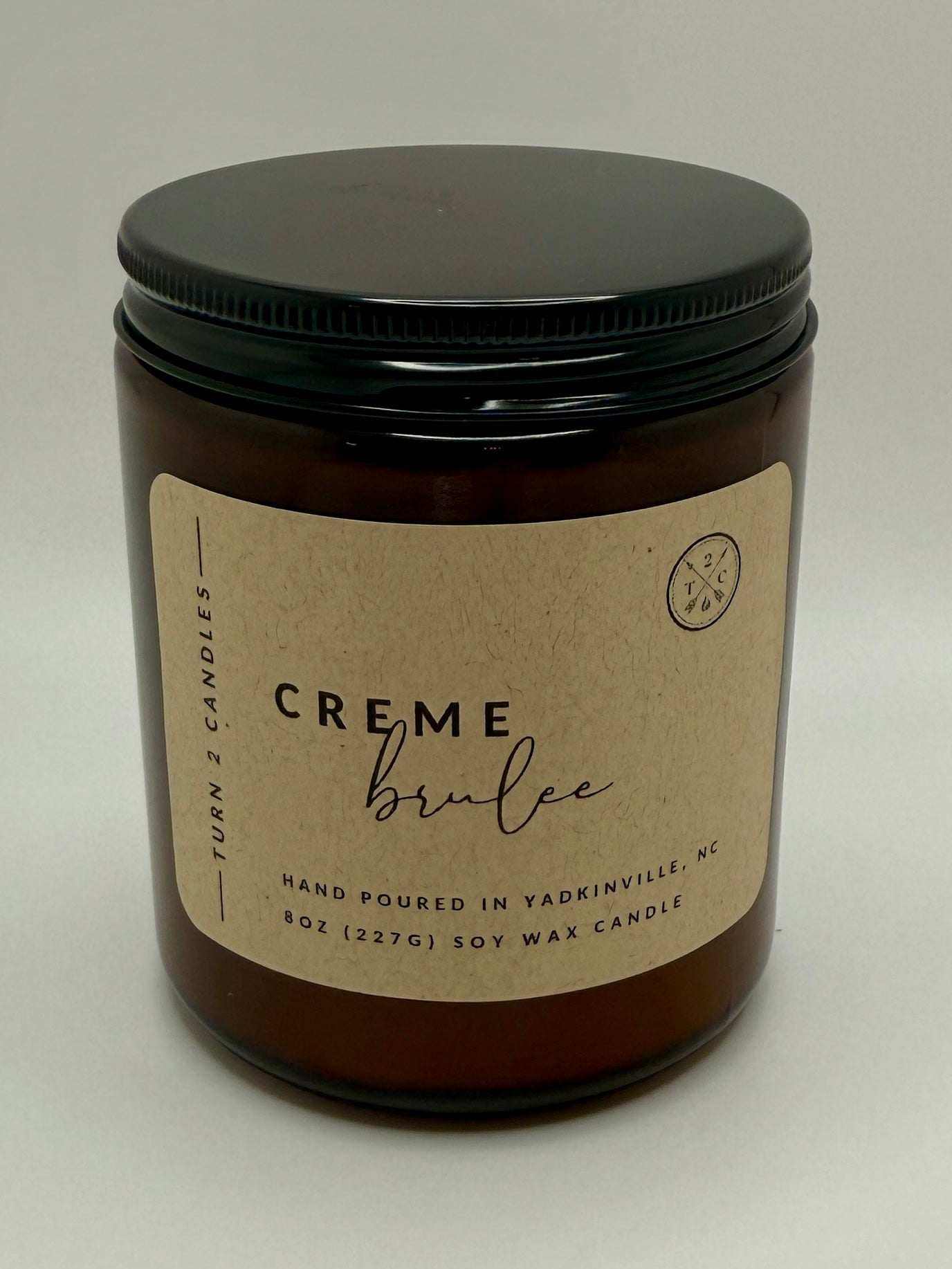 8oz amber jar candle with hand-poured soy wax and clean fragrance oils in a brown glass container