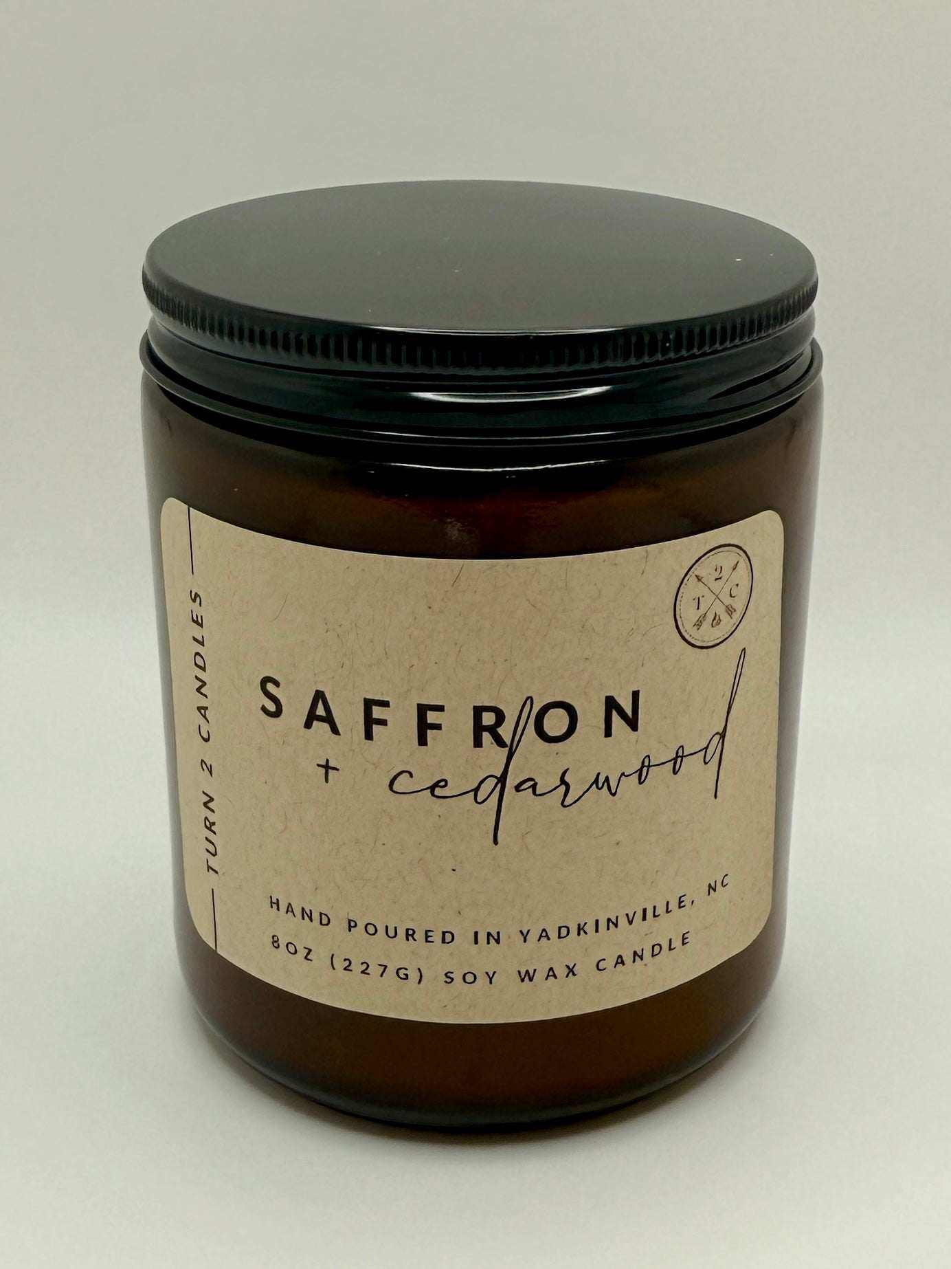 8oz amber jar candle with saffron and cedarwood scent, hand-poured soy wax, eco-friendly and clean-burning