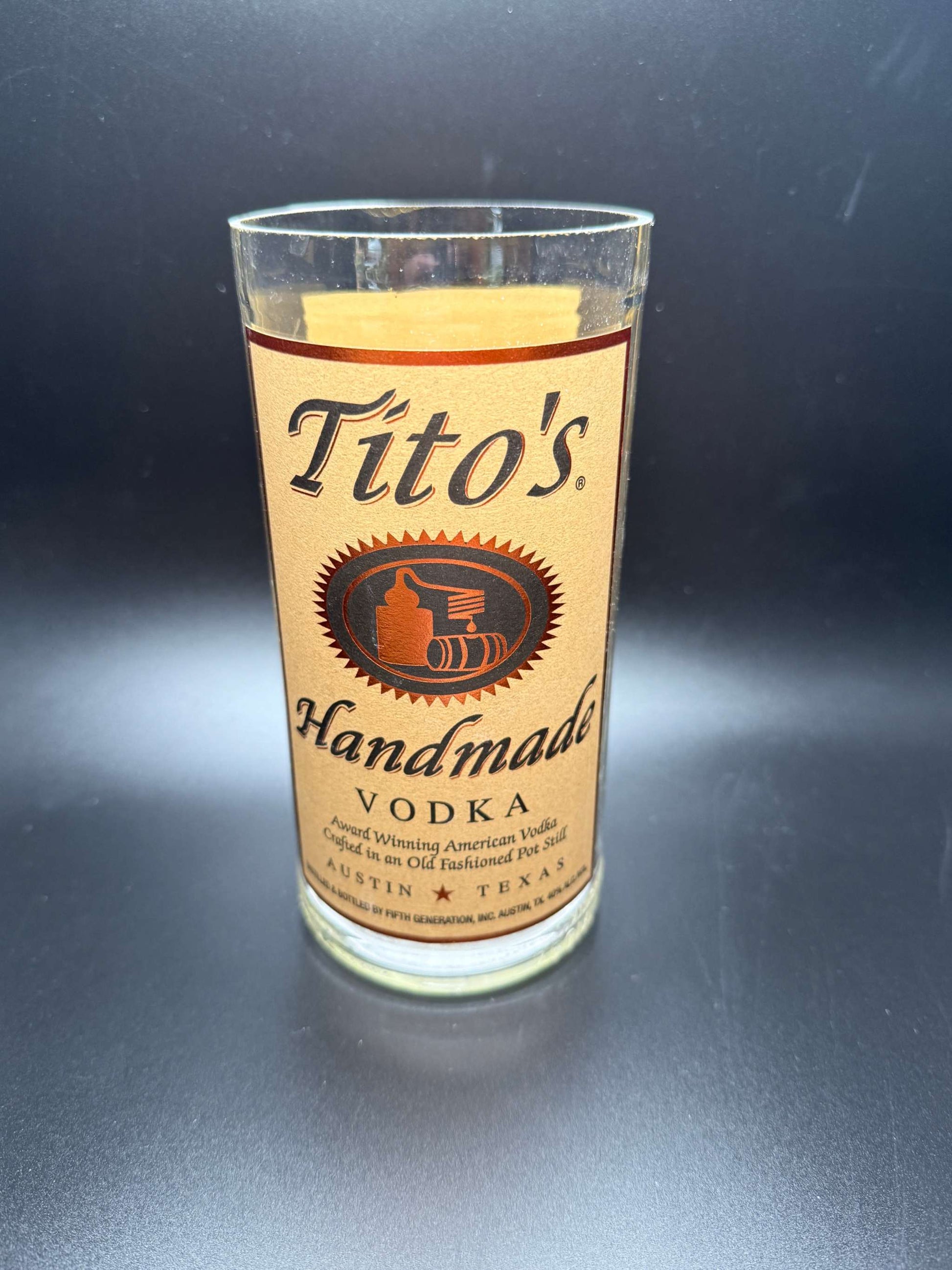 Hand-poured soy Vodka Bottle Candle in upcycled Tito's vodka bottle with custom fragrance options
