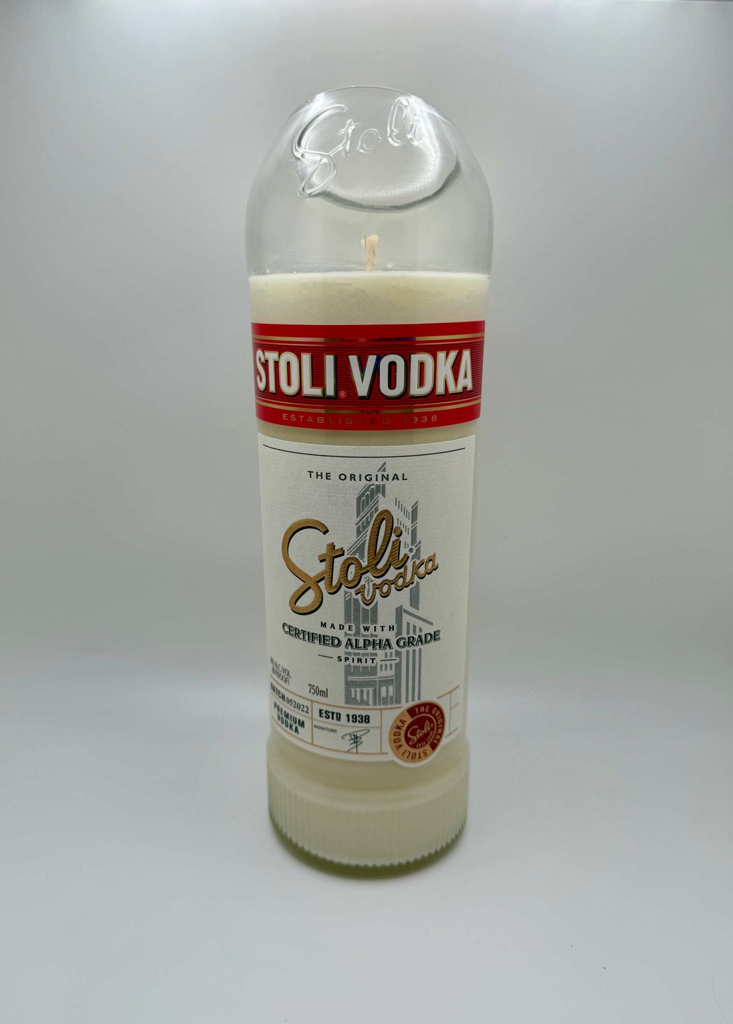 Upcycled vodka bottle candle with mango and coconut milk fragrance in soy wax