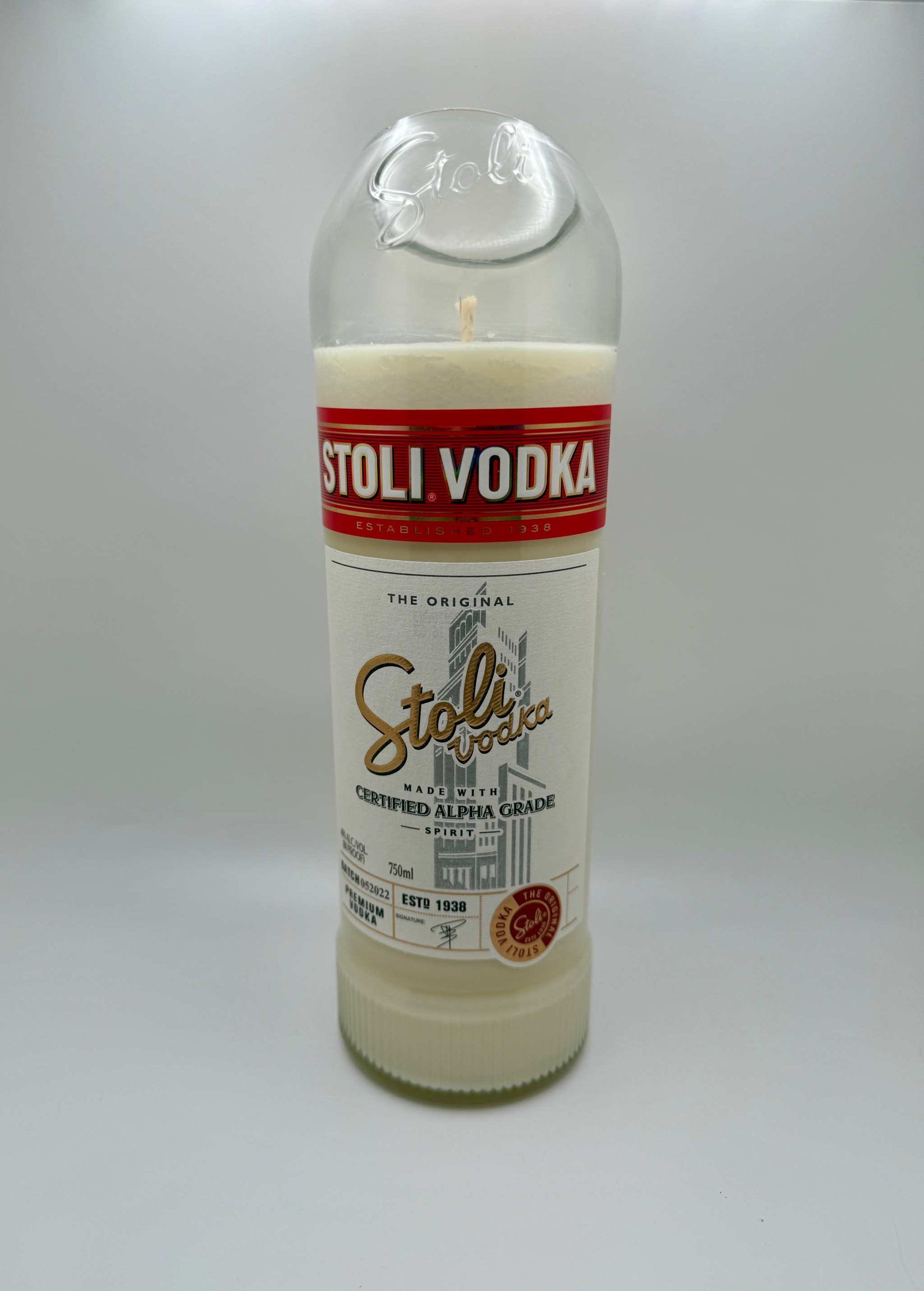 Upcycled vodka bottle candle with mango and coconut milk fragrance in soy wax