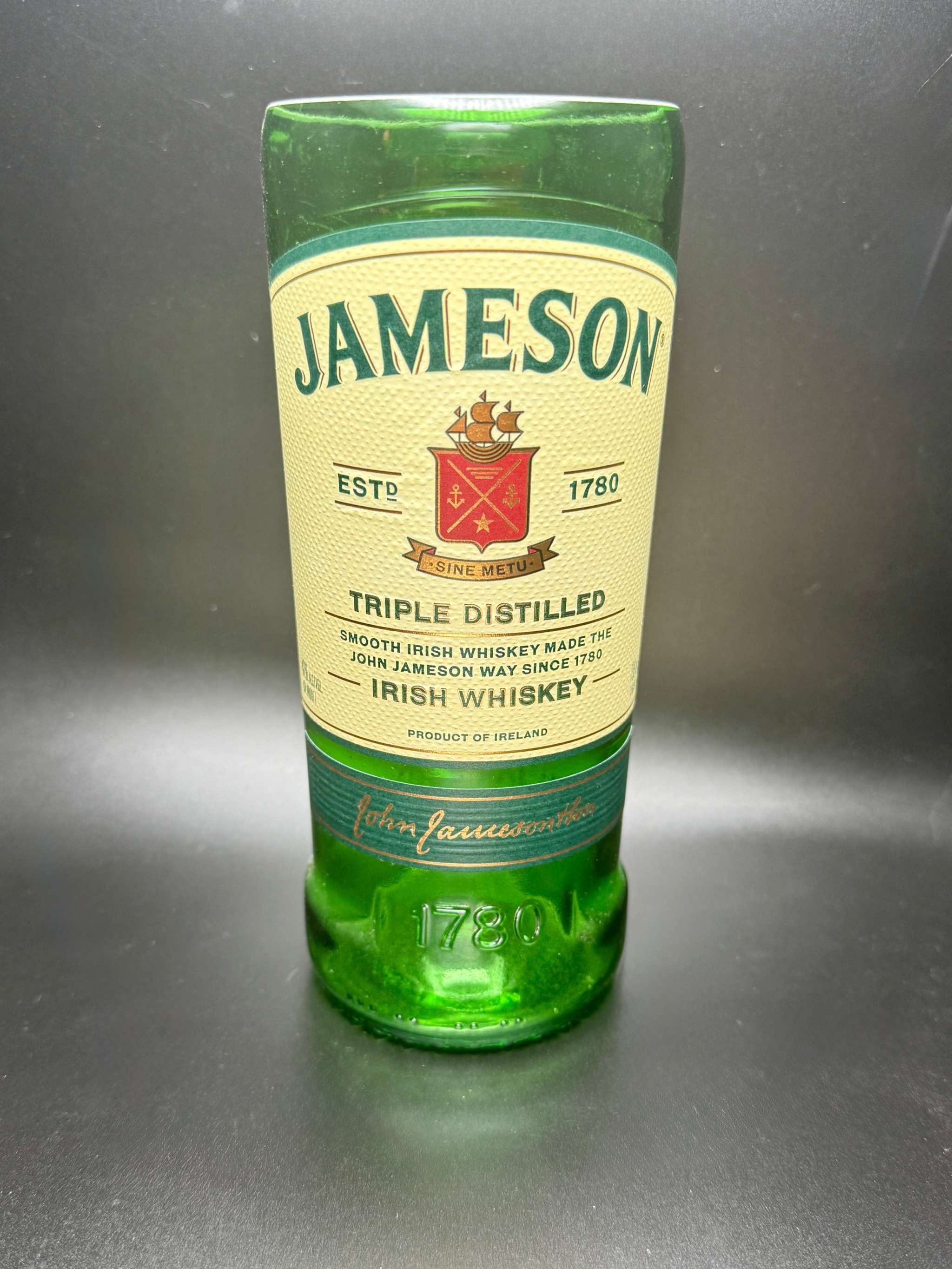 Whiskey Bottle Candle made from upcycled Jameson whiskey bottle with double wick soy candle inside