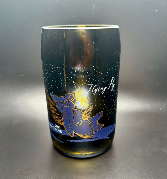 Upcycled wine bottle soy candle with flying pig design and customizable fragrance