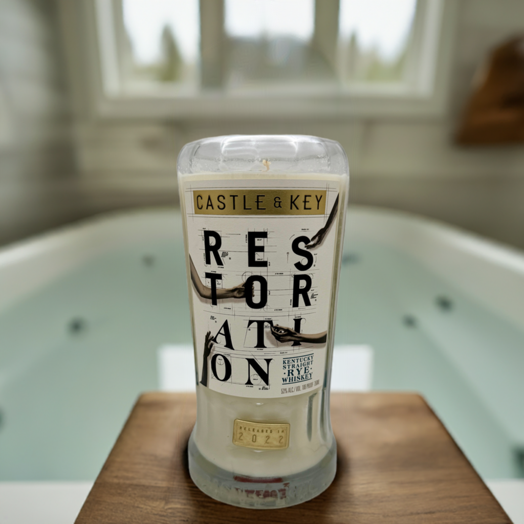 Upcycled whiskey bottle candle with Palo Santo fragrance, soy wax, 80-hour burn time, cedarwood and sandalwood notes